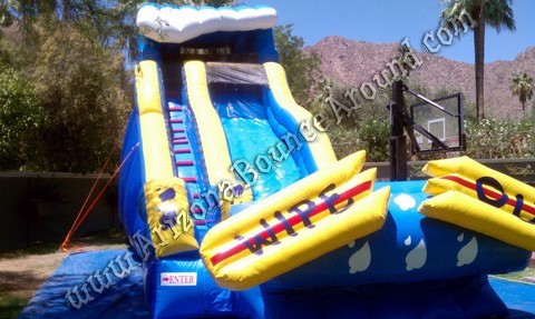 Wipe Out inflatable water slide rental